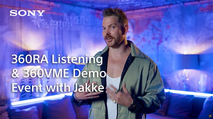 Jakke standing in studio setting, talking about his event